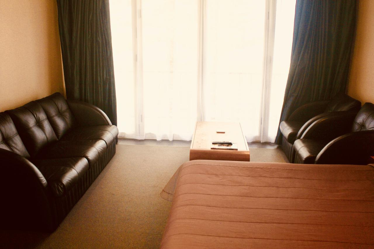 โรงแรม เดอะ นอติลุส เนเปียร์ ภายนอก รูปภาพ A room at the hotel